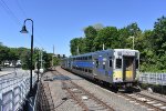 LIRR Train # 627, heading from Port Jefferson to Jamaica, arrives into Stony Brook Station behind C3 Cab Car # 5022